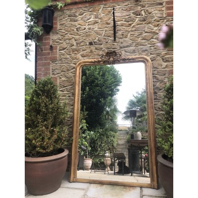 Large French Gilt Wood And Composition Domed Top Mirror With Floral Surmount   113165897896